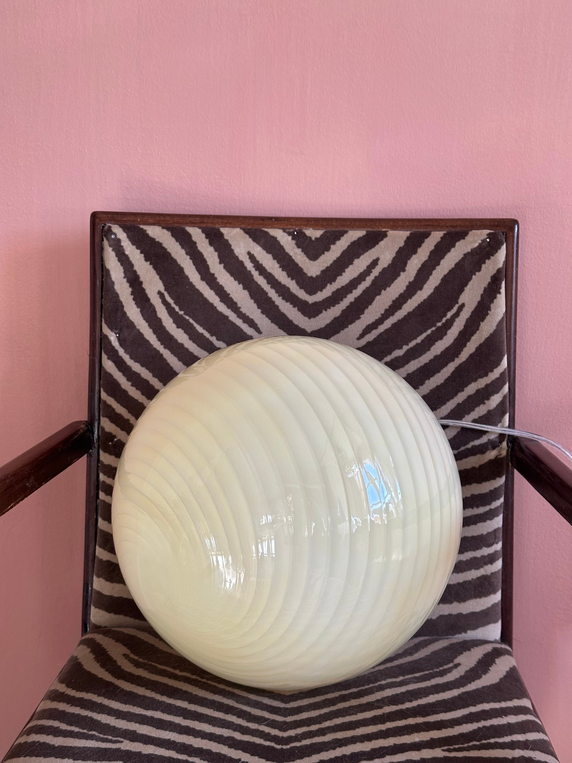 Retro murano style cream swirl glass pendant lamp showing spiral glass texture unlit