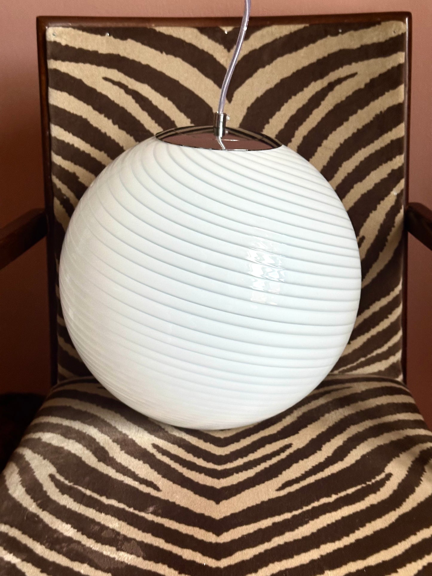 Vintage retro murano style white swirl glass globe pendant lamp, round art glass shade close up 